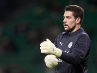 Stefan Ortega of Manchester City warms up before the UEFA Champions League match between Sporting CP and Manchester City at Jose Alvalade St...