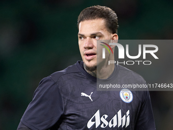 Ederson of Manchester City warms up before the UEFA Champions League match between Sporting CP and Manchester City at Jose Alvalade Stadium...