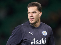 Ederson of Manchester City warms up before the UEFA Champions League match between Sporting CP and Manchester City at Jose Alvalade Stadium...