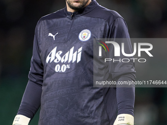 Stefan Ortega of Manchester City warms up before the UEFA Champions League match between Sporting CP and Manchester City at Jose Alvalade St...