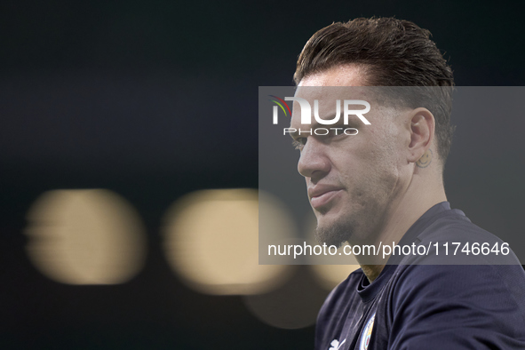 Ederson of Manchester City looks on during the warm-up before the UEFA Champions League match between Sporting CP and Manchester City at Jos...