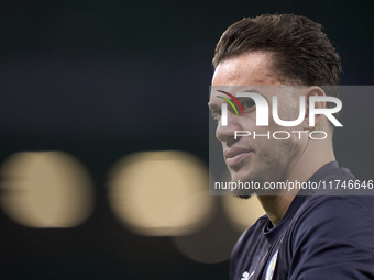 Ederson of Manchester City looks on during the warm-up before the UEFA Champions League match between Sporting CP and Manchester City at Jos...