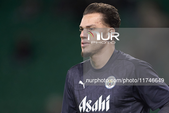 Ederson of Manchester City warms up before the UEFA Champions League match between Sporting CP and Manchester City at Jose Alvalade Stadium...