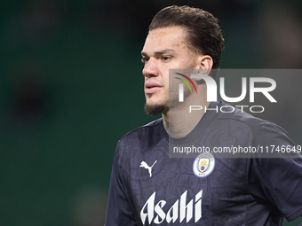 Ederson of Manchester City warms up before the UEFA Champions League match between Sporting CP and Manchester City at Jose Alvalade Stadium...