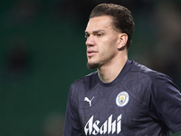 Ederson of Manchester City warms up before the UEFA Champions League match between Sporting CP and Manchester City at Jose Alvalade Stadium...