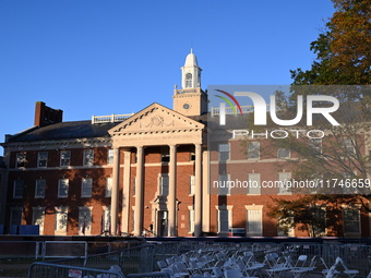 Debris and American flags are on the ground at an empty Howard University at the site of the Harris-Walz Election Night Headquarters followi...