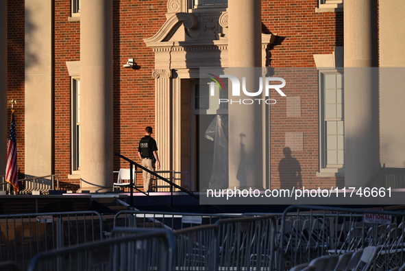 Debris and American flags are on the ground at an empty Howard University at the site of the Harris-Walz Election Night Headquarters followi...