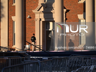 Debris and American flags are on the ground at an empty Howard University at the site of the Harris-Walz Election Night Headquarters followi...