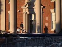 Debris and American flags are on the ground at an empty Howard University at the site of the Harris-Walz Election Night Headquarters followi...