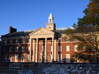 Debris and American flags are on the ground at an empty Howard University at the site of the Harris-Walz Election Night Headquarters followi...