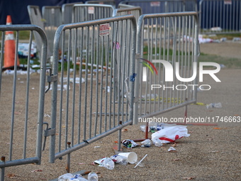 Debris and American flags are on the ground at an empty Howard University at the site of the Harris-Walz Election Night Headquarters followi...