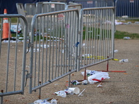 Debris and American flags are on the ground at an empty Howard University at the site of the Harris-Walz Election Night Headquarters followi...