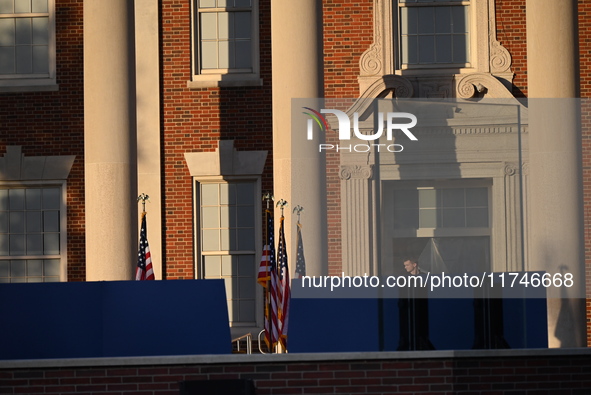 Debris and American flags are on the ground at an empty Howard University at the site of the Harris-Walz Election Night Headquarters followi...