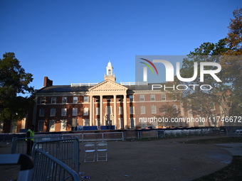 Debris and American flags are on the ground at an empty Howard University at the site of the Harris-Walz Election Night Headquarters followi...