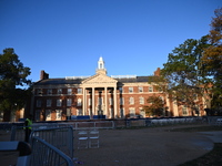 Debris and American flags are on the ground at an empty Howard University at the site of the Harris-Walz Election Night Headquarters followi...