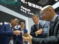 Visitors learn about AMD EPYC 9005 series processors at the 7th CIIE in Shanghai, China, on November 6, 2024. (