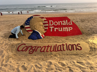 A sand sculpture of newly elected U.S. President Donald Trump is seen on the eastern coast beach of the Bay of Bengal at Puri, approximately...