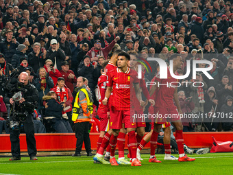 Liverpool's Luis Diaz celebrates after scoring during the UEFA Champions League 2024/25 League Phase MD4 match between Liverpool and Bayer L...