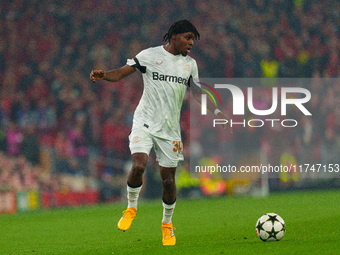 Jeremie Frimpong of Bayer Leverkusen is in action during the UEFA Champions League 2024/25 League Phase MD4 match between Liverpool and Baye...