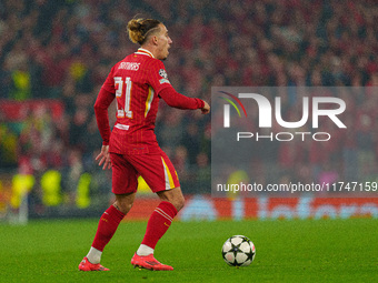 Liverpool's Kostas Tsimikas is in action during the UEFA Champions League 2024/25 League Phase MD4 match between Liverpool and Bayer Leverku...