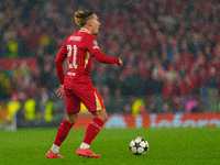 Liverpool's Kostas Tsimikas is in action during the UEFA Champions League 2024/25 League Phase MD4 match between Liverpool and Bayer Leverku...