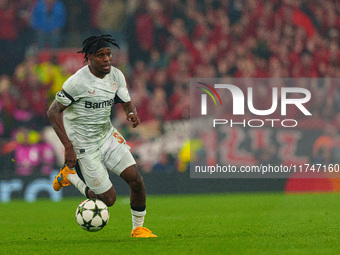 Jeremie Frimpong of Bayer Leverkusen is in action during the UEFA Champions League 2024/25 League Phase MD4 match between Liverpool and Baye...