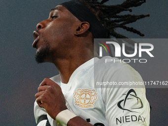 Jeremie Frimpong of Bayer Leverkusen is in action during the UEFA Champions League 2024/25 League Phase MD4 match between Liverpool and Baye...