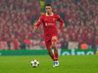 Liverpool's Trent Alexander-Arnold is in action after scoring during the UEFA Champions League 2024/5 League Phase MD4 match between Liverpo...