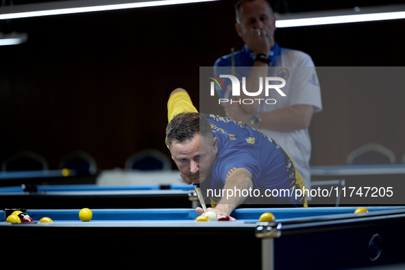 A participant from the Catalunya Blackball Association men's team performs during one of the events at the inaugural IBF World Blackball Cha...