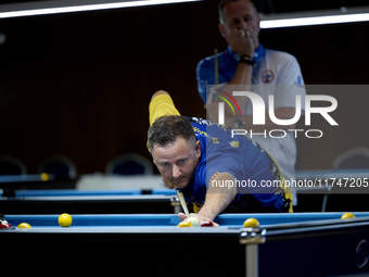 A participant from the Catalunya Blackball Association men's team performs during one of the events at the inaugural IBF World Blackball Cha...