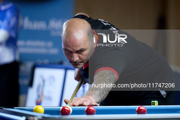 A participant from the Malta Blackball Association men's team performs during one of the events at the inaugural IBF World Blackball Champio...