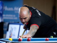 A participant from the Malta Blackball Association men's team performs during one of the events at the inaugural IBF World Blackball Champio...