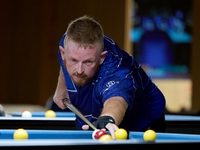 A participant from the Scotland Pool Association men's team performs during one of the events at the inaugural IBF World Blackball Champions...