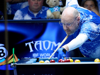 A participant from the Scotland Pool Association men's team performs during one of the events at the inaugural IBF World Blackball Champions...