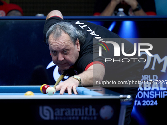 A participant from the Malta Blackball Association men's team performs during one of the events at the inaugural IBF World Blackball Champio...