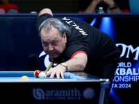 A participant from the Malta Blackball Association men's team performs during one of the events at the inaugural IBF World Blackball Champio...