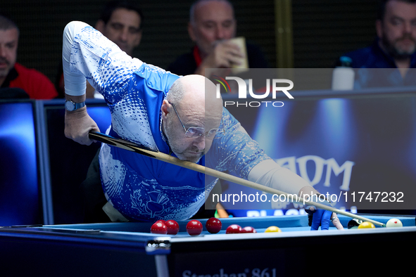 A participant from the Scotland Pool Association men's team performs during one of the events at the inaugural IBF World Blackball Champions...