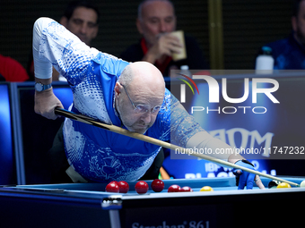 A participant from the Scotland Pool Association men's team performs during one of the events at the inaugural IBF World Blackball Champions...