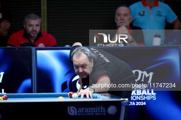 A participant from the Malta Blackball Association men's team performs during one of the events at the inaugural IBF World Blackball Champio...