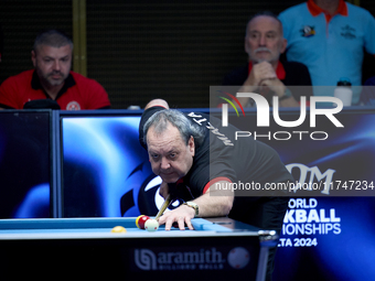 A participant from the Malta Blackball Association men's team performs during one of the events at the inaugural IBF World Blackball Champio...