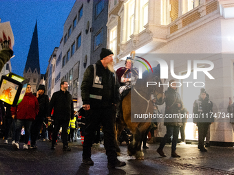 Thousands of children participate in the Martin parade in Bonn, Germany, on November 6, 2024. (