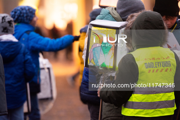 Thousands of children participate in the Martin parade in Bonn, Germany, on November 6, 2024. 