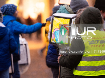 Thousands of children participate in the Martin parade in Bonn, Germany, on November 6, 2024. (