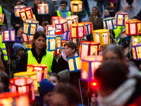 Thousands of children participate in the Martin parade in Bonn, Germany, on November 6, 2024. (