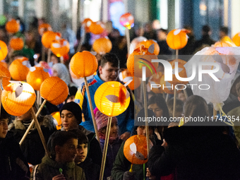 Thousands of children participate in the Martin parade in Bonn, Germany, on November 6, 2024. (