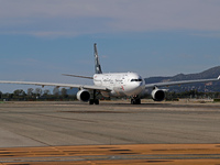 An Airbus A330-343 from Air China, in Star Alliance livery, is on the runway ready to take off from Barcelona airport in Barcelona, Spain, o...