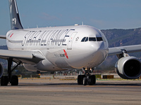 An Airbus A330-343 from Air China, in Star Alliance livery, is on the runway ready to take off from Barcelona airport in Barcelona, Spain, o...