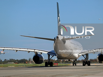 An Airbus A330-343 from Air China, in Star Alliance livery, is on the runway ready to take off from Barcelona airport in Barcelona, Spain, o...