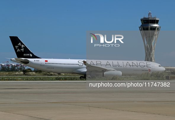 An Airbus A330-343 from Air China, in Star Alliance livery, is on the runway ready to take off from Barcelona airport in Barcelona, Spain, o...