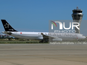 An Airbus A330-343 from Air China, in Star Alliance livery, is on the runway ready to take off from Barcelona airport in Barcelona, Spain, o...